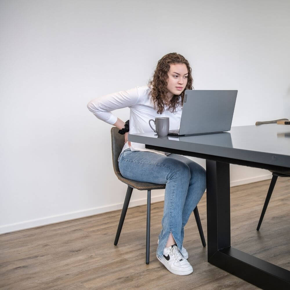 Pijn tijdens het thuiswerken? 8 tips voor de beste zithouding